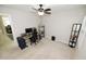 Bedroom featuring a ceiling fan, desk with computer, and carpeted floors at 2123 Gregor Overlook Ln, Apex, NC 27502