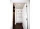 Functional entryway with built-in storage and a view into the kitchen at 2123 Gregor Overlook Ln, Apex, NC 27502