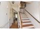 Bright entryway featuring hardwood steps with white risers and white walls at 228 Old Colony Way, Rocky Mount, NC 27804