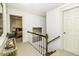Hallway with carpeted floors and traditional decor, leading to multiple rooms at 228 Old Colony Way, Rocky Mount, NC 27804