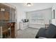 Relaxing bedroom featuring a personal sauna, comfortable seating, and ample natural light at 2308 Swansea Ln, Apex, NC 27502