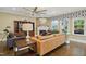 Inviting living room featuring a fireplace, stylish decor, and ample seating at 2308 Swansea Ln, Apex, NC 27502