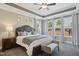 Elegant main bedroom with tray ceilings, plush carpeting, and plenty of natural light at 2308 Swansea Ln, Apex, NC 27502
