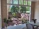 Private back patio with serene garden views and space for outdoor seating at 233 Sweet Bay Pl, Carrboro, NC 27510