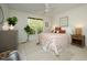 Bedroom with a ceiling fan, rug, decor, and natural light from the window creates a cozy atmosphere at 233 Sweet Bay Pl, Carrboro, NC 27510