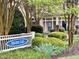 Community entrance featuring manicured landscaping, creating a welcoming and inviting atmosphere at 233 Sweet Bay Pl, Carrboro, NC 27510