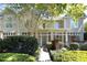 Charming townhouse exterior featuring well-manicured landscaping and a welcoming front porch at 233 Sweet Bay Pl, Carrboro, NC 27510
