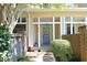 Inviting front porch with brick accents, offering a cozy entrance to the home at 233 Sweet Bay Pl, Carrboro, NC 27510