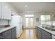 Functional kitchen with stainless steel sink, ample counter space, and modern cabinetry at 233 Sweet Bay Pl, Carrboro, NC 27510