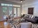 Stylish living room with hardwood floors, modern furnishings, and natural light at 233 Sweet Bay Pl, Carrboro, NC 27510