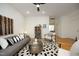 Inviting living room with modern decor, hardwood floors, and ample seating at 233 Sweet Bay Pl, Carrboro, NC 27510