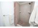 Shower featuring tiled walls, showerhead, and a decorative curtain creating a spa-like experience at 233 Sweet Bay Pl, Carrboro, NC 27510