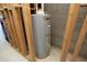 New water heater, recently installed, ready for its new owners in unfinished basement at 233 Sweet Bay Pl, Carrboro, NC 27510