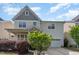 Charming two-story home featuring a welcoming porch, landscaped yard and attached garage at 3047 Kilarney Ridge Loop, Cary, NC 27511