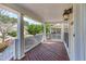 Inviting front porch with classic white railings offering an illuminated outdoor space at 3047 Kilarney Ridge Loop, Cary, NC 27511