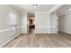 A brightly lit room with hardwood floors, neutral paint, and lots of open space at 3047 Kilarney Ridge Loop, Cary, NC 27511