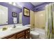 Inviting bathroom with traditional vanity, bathtub, and ample natural light at 3217 Brennan Dr, Raleigh, NC 27613