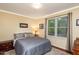 Cozy bedroom with natural light, carpet, and traditional furnishings at 3217 Brennan Dr, Raleigh, NC 27613