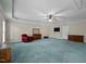 Spacious carpeted bedroom with ceiling fan and furnishings at 359 Punch Hill Farm Rd, Rougemont, NC 27572