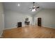 Spacious living room boasts wood floors, vaulted ceilings, and an open floor plan at 359 Punch Hill Farm Rd, Rougemont, NC 27572