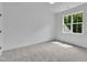 Bright and empty bedroom features a large window offering natural light at 3920 Cedar Knolls Drive Dr # 18, Youngsville, NC 27596