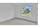 Bright bedroom with a view of the outdoors through a large window at 3920 Cedar Knolls Drive Dr # 18, Youngsville, NC 27596