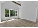 Bright bedroom with a large window and beautiful wood flooring at 3920 Cedar Knolls Drive Dr # 18, Youngsville, NC 27596