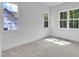 Bedroom with three windows providing ample natural light at 3920 Cedar Knolls Drive Dr # 18, Youngsville, NC 27596