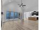Spacious living room with vaulted ceilings, hardwood floors, and sliding doors to the deck at 3920 Cedar Knolls Drive Dr # 18, Youngsville, NC 27596