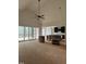 Spacious living room with access to a screened porch and an adjacent kitchen at 3920 Cedar Knolls Drive Dr # 18, Youngsville, NC 27596