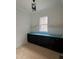 Mudroom with white countertop, black cabinets, and floating shelves at 3920 Cedar Knolls Drive Dr # 18, Youngsville, NC 27596