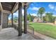 Covered front porch with stone columns and a view of the large front yard at 3920 Cedar Knolls Drive Dr # 18, Youngsville, NC 27596