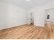 Bedroom with wood floors, natural light, a closet, and bright white walls at 42 Ponchartrain St, Fuquay Varina, NC 27526