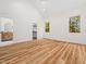 Primary bedroom with wood floors, closet and an ensuite bathroom at 42 Ponchartrain St, Fuquay Varina, NC 27526