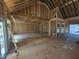 Interior framing of new construction showing a large open concept space with a fireplace area at 42 Ponchartrain St, Fuquay Varina, NC 27526