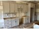 Unfinished modern kitchen with shaker cabinets and ample counter space, ready for customization at 42 Ponchartrain St, Fuquay Varina, NC 27526