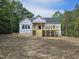 New home under construction featuring a deck and partially finished yard at 42 Ponchartrain St, Fuquay Varina, NC 27526