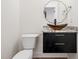 Stylish powder room featuring a unique vessel sink and modern vanity at 42 Ponchartrain St, Fuquay Varina, NC 27526