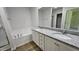 Bathroom boasts double sinks with granite countertop, soaking tub, and separate shower with glass door at 427 Magnolia Run Way, Benson, NC 27504