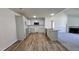 Modern kitchen features stylish cabinets, granite countertops, and an open layout with hardwood floors at 427 Magnolia Run Way, Benson, NC 27504