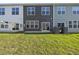 Backyard with well maintained lawn, perfect for outdoor activities at 43 Pansy Park # 233, Clayton, NC 27520