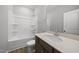 Bathroom with quartz countertop, undermount sink and walk in shower and tub combo at 43 Pansy Park # 233, Clayton, NC 27520