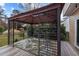 Back deck featuring a seating area with overhead shelter and a view of the backyard at 4318 Peachway Dr, Durham, NC 27705