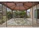 Back deck with seating, covering, and an outdoor rug, perfect for entertaining or relaxing at 4318 Peachway Dr, Durham, NC 27705