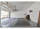 Large three car garage with coated floors and ample room for storage at 437 Creekhurst Pl, Cary, NC 27519