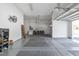 Spacious 3-car garage with an epoxy floor, great for storage and parking at 437 Creekhurst Pl, Cary, NC 27519