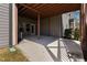 Covered outdoor patio area, perfect for entertaining and relaxing with natural light and shade at 437 Creekhurst Pl, Cary, NC 27519