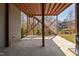 Spacious covered patio with stairs to the yard, providing an ideal outdoor living space at 437 Creekhurst Pl, Cary, NC 27519