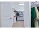 Organized walk-in closet with shelving and hanging space for storage at 437 Creekhurst Pl, Cary, NC 27519