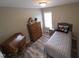 Cozy bedroom with a comfortable bed and desk, perfect for relaxation and productivity at 46 Grain Ln, Henderson, NC 27537